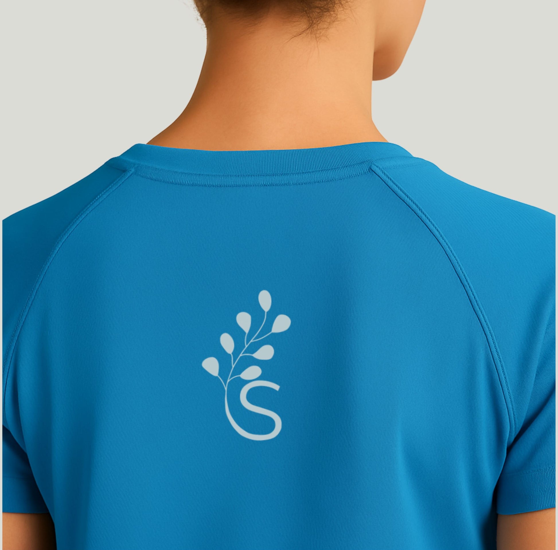 Recycled blue women's sports T-shirt with Soworn logo, made for comfort and sustainability.
